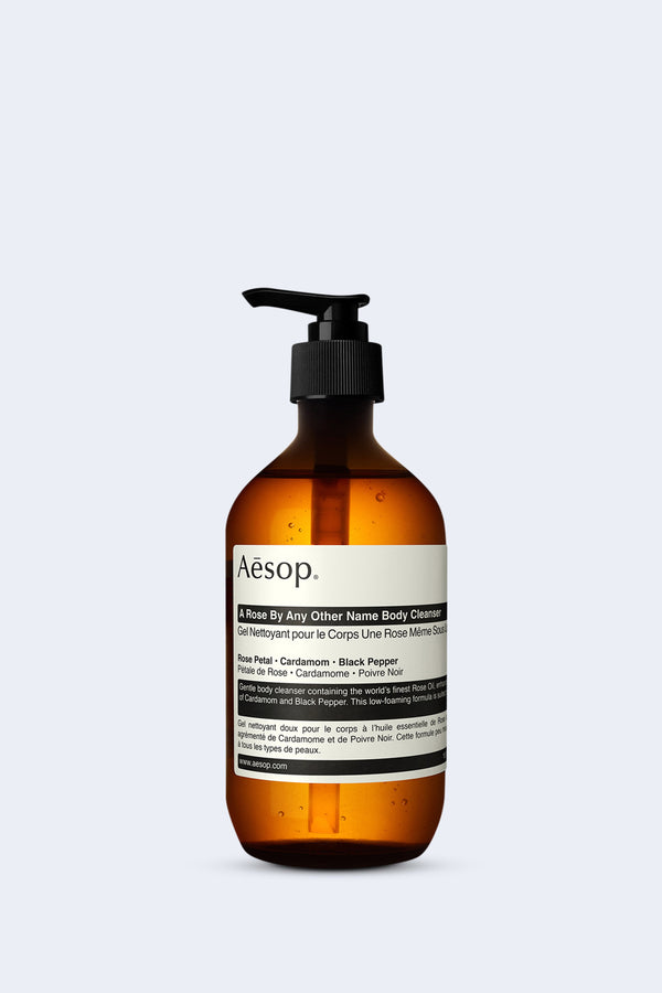 A bottle of 'A Rose By Any Other Name Body Cleanser' by Aesop on a white backdrop